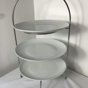 Trio of white plates on cake stand for hire